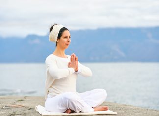 Kundalini Yoga: Definition, History, and Cautions