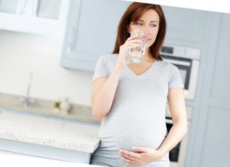 When and How To Prepare For Labor After Marriage: What Every Expecting Parents Should Know pregnant woman drinking
