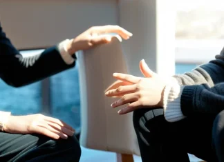 Ways To Beat Shame Person finding inner peace and self-acceptance by sunlit window