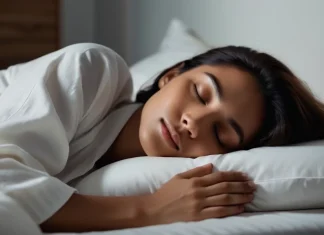 Rewire Your Brain While You Are Asleep Person sleeping peacefully under warm duvet in tranquil bedroom